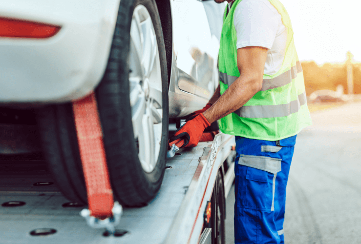 EV breakdown tow on flatbed truck