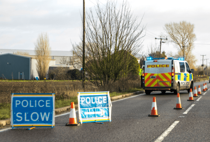 Police control zone on road