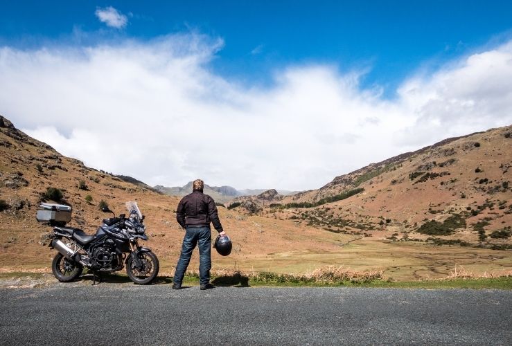 Motorcyclist taking in views