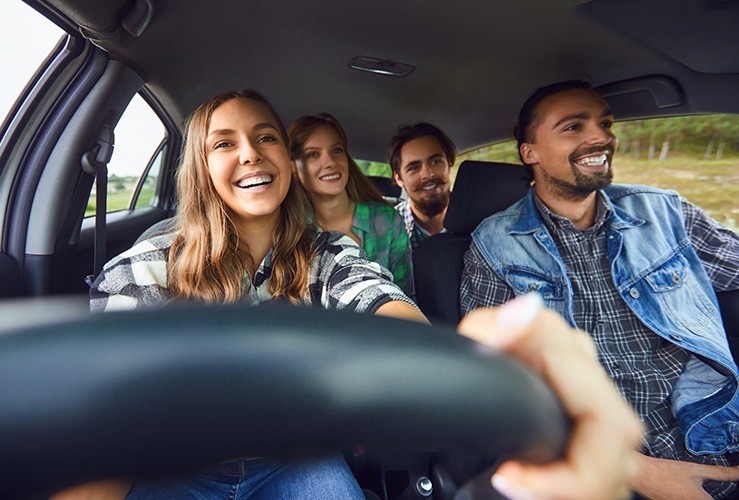 Driver with friends in passenger seats