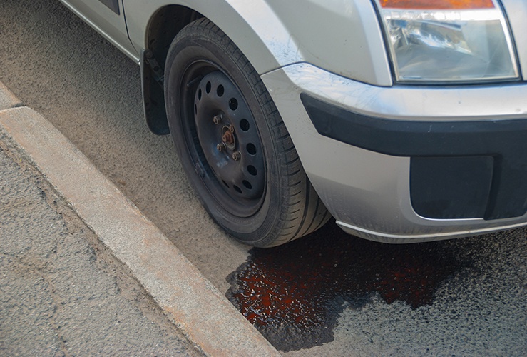 Oil leak from engine on road