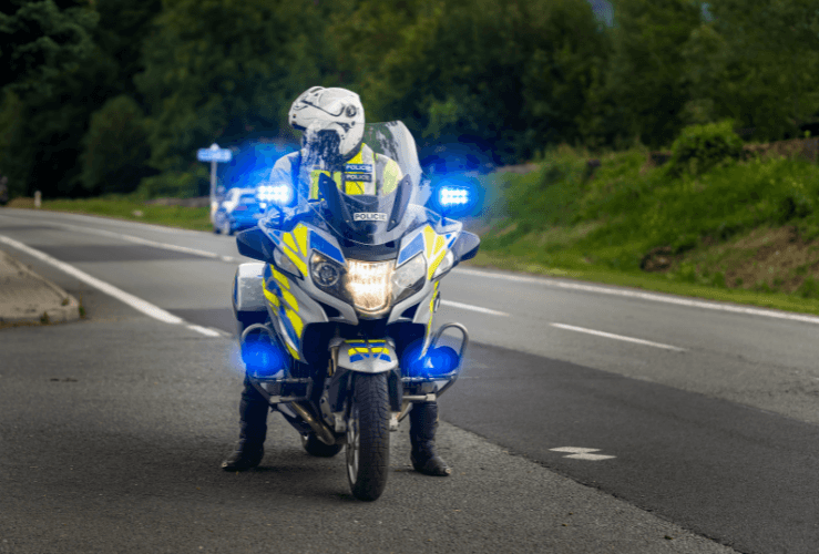 Policeman on motorbike